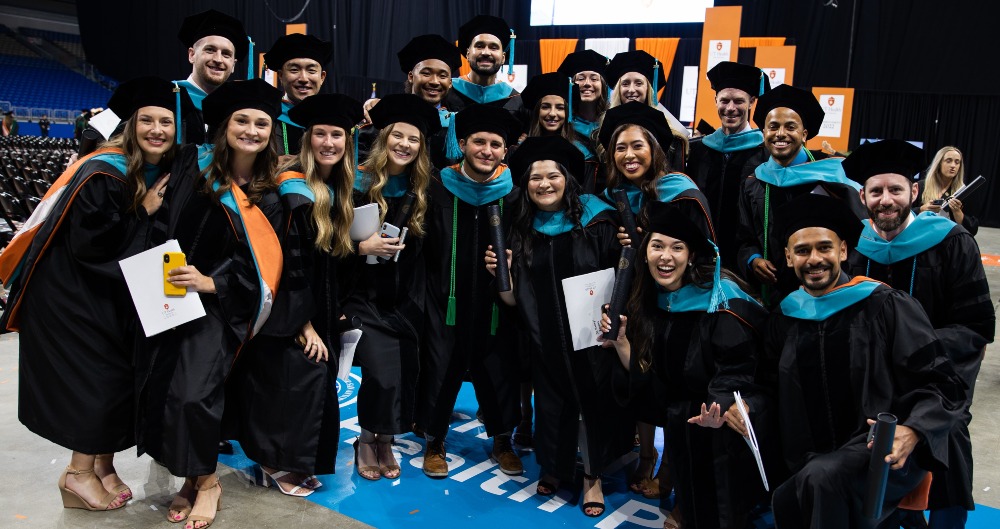 Graduates from the School of Health Professions pose after commencement