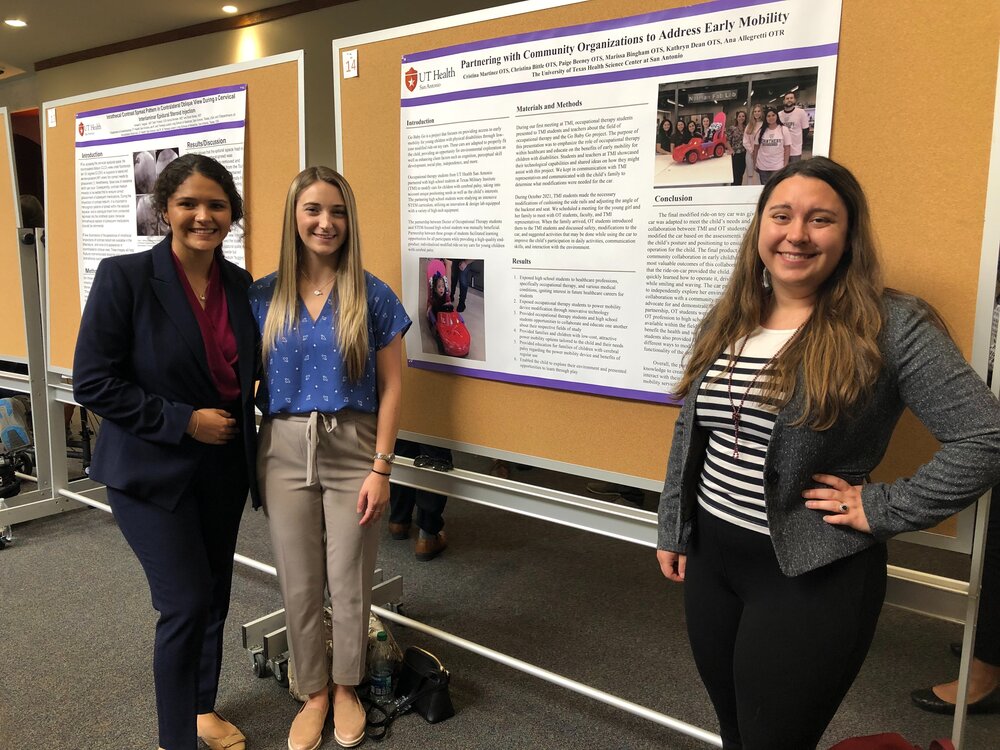 Third-year occupational therapy students present their research post at UT Health San Antonio’s Rehabilitation Research Day.