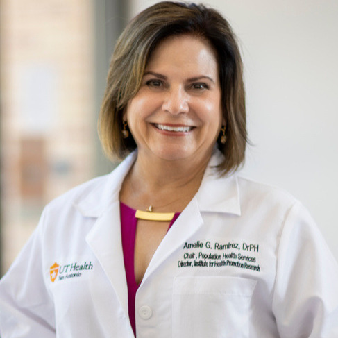 Professional head shot of Dr. Amelie Ramirez in a black top.