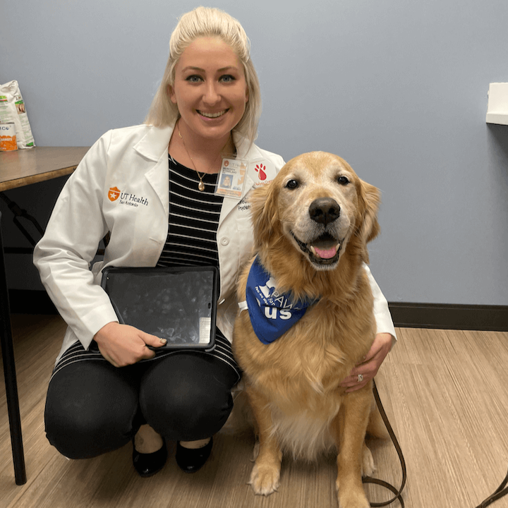 Therapy dog, Gus, assists researcher Meredith Stensland