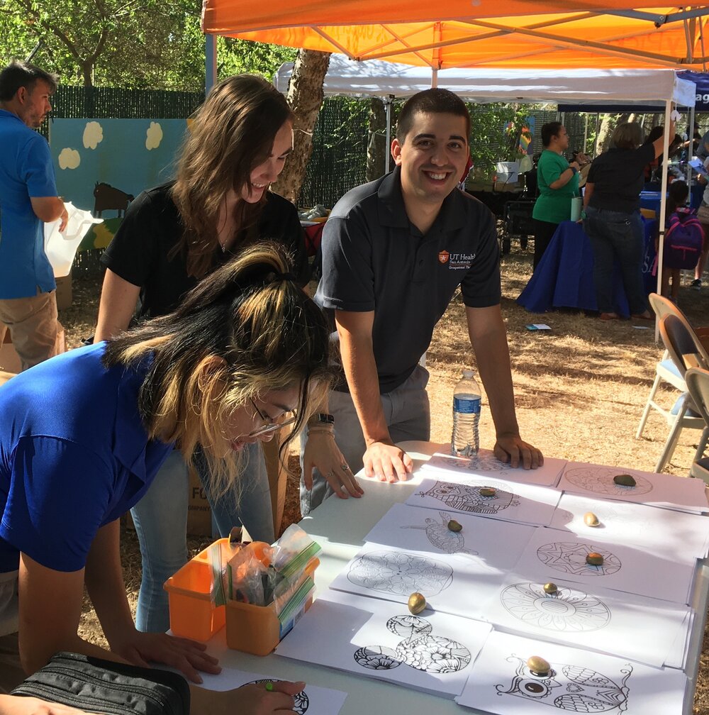Occupational therapy students volunteer at back to school event 